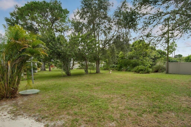 view of yard with fence