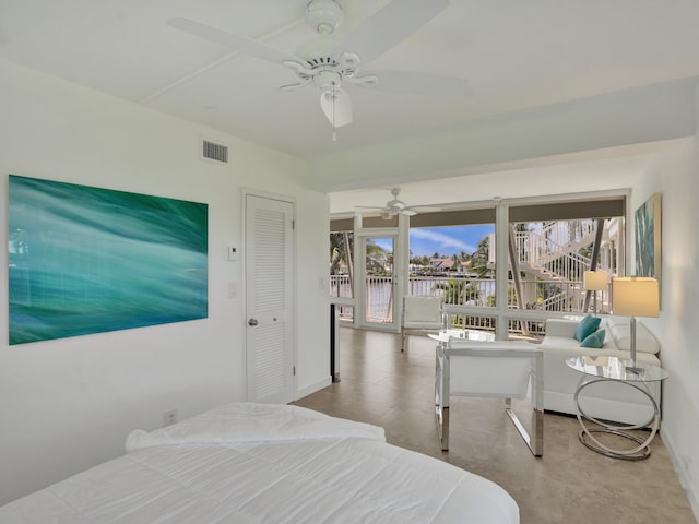 bedroom with access to exterior, multiple windows, a closet, and ceiling fan