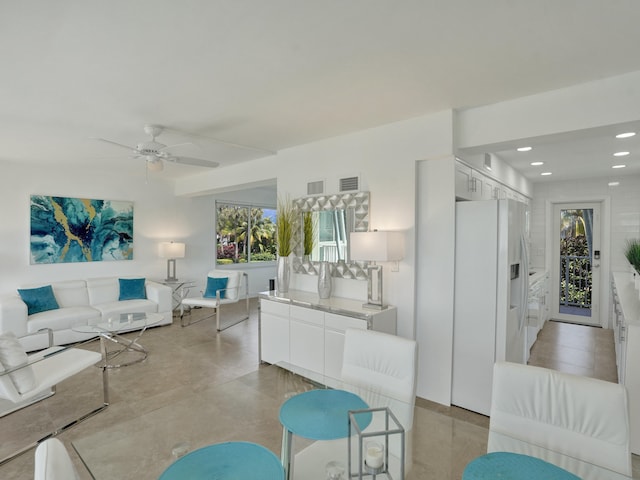 living room with ceiling fan