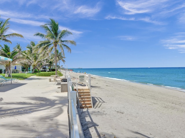 property view of water featuring a beach view