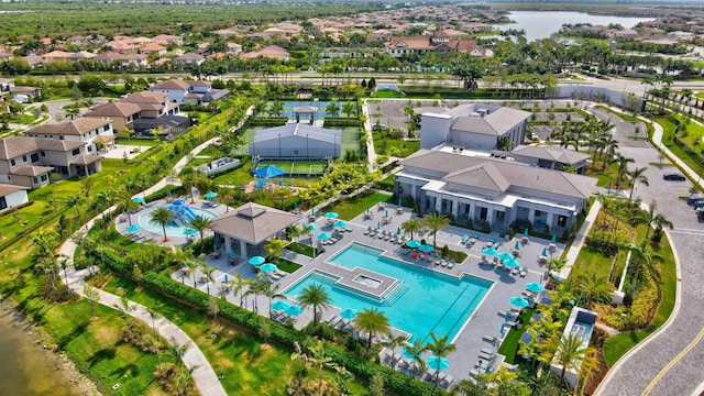 birds eye view of property featuring a water view