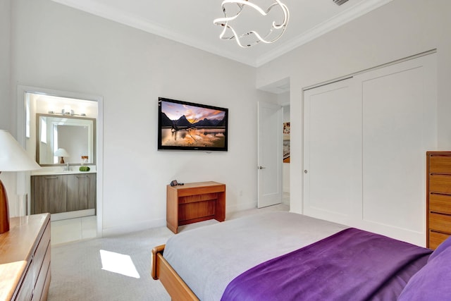 carpeted bedroom featuring a closet, crown molding, and a notable chandelier