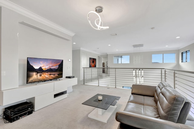 living room featuring a chandelier, light colored carpet, and ornamental molding