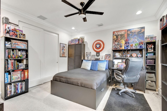 bedroom with ceiling fan, light colored carpet, and crown molding