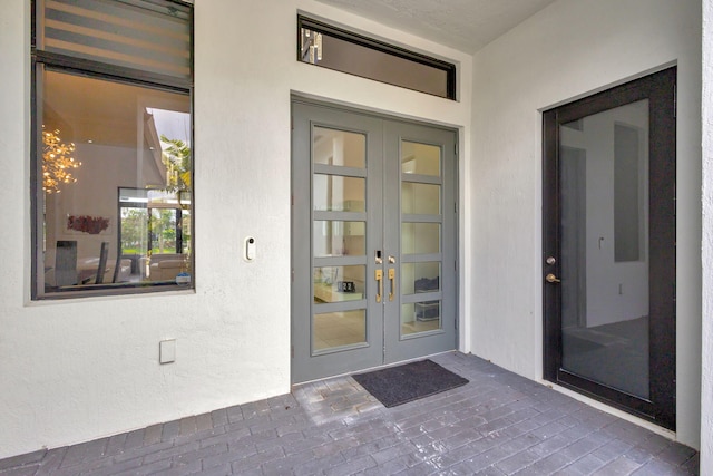 entrance to property featuring french doors