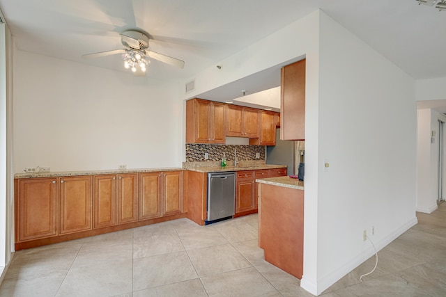 kitchen featuring decorative backsplash, light tile patterned floors, stainless steel dishwasher, light stone counters, and ceiling fan