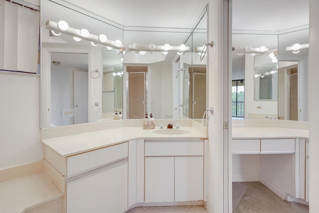 bathroom featuring vanity and tile patterned floors