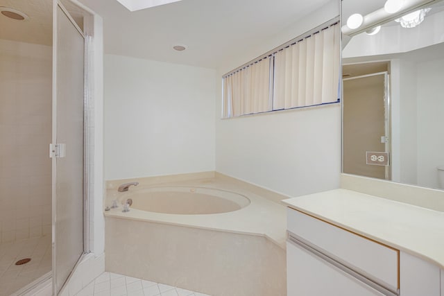 bathroom with vanity, separate shower and tub, and tile patterned flooring