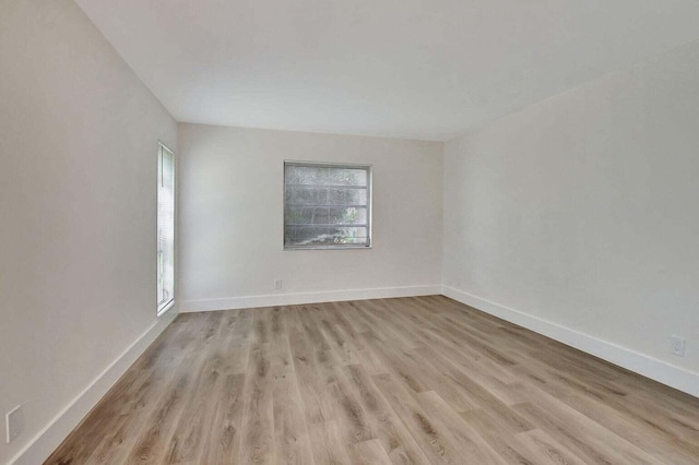 empty room with light wood-type flooring