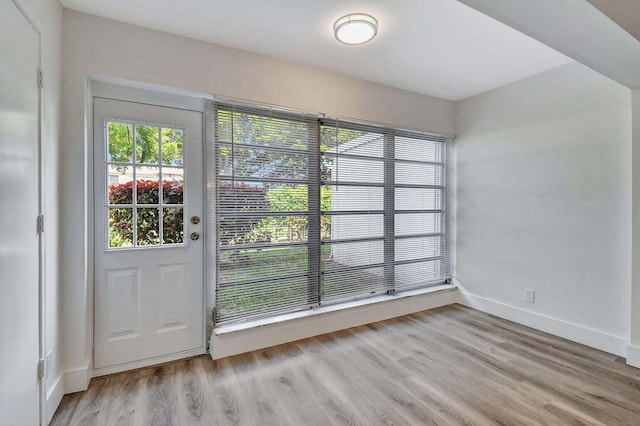 doorway featuring light wood-type flooring