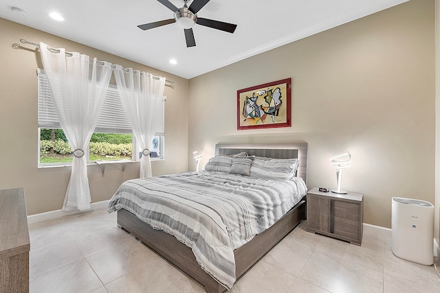 bedroom featuring ceiling fan and light tile patterned floors