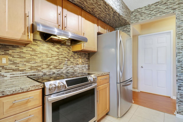 kitchen featuring dishwasher, light hardwood / wood-style flooring, plenty of natural light, and sink