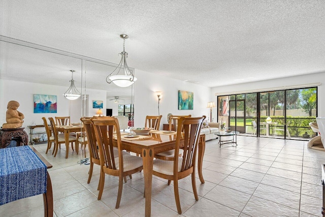 dining room with ceiling fan