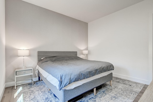 bedroom featuring light wood-type flooring