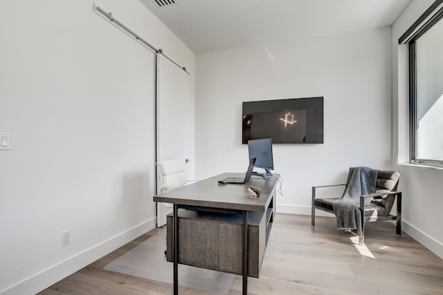 office area with light hardwood / wood-style flooring