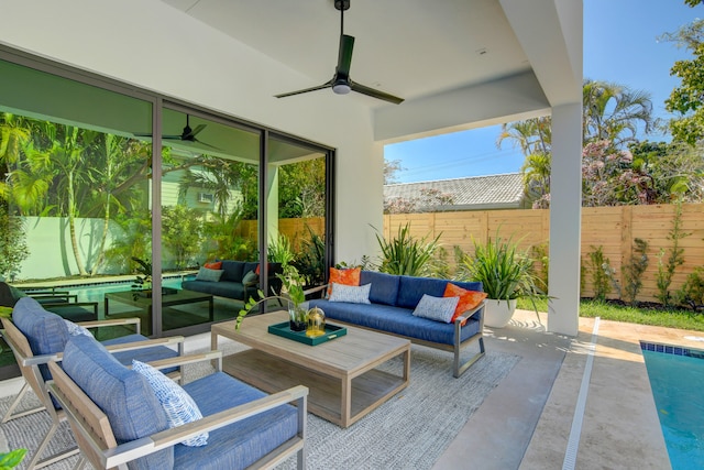 view of patio with ceiling fan, a pool, and outdoor lounge area