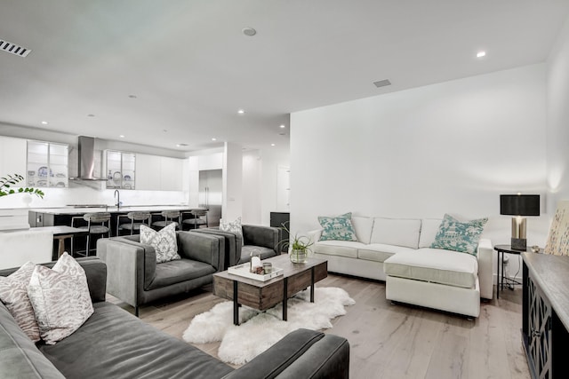 living room with light hardwood / wood-style floors