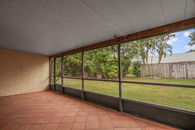 unfurnished sunroom with plenty of natural light