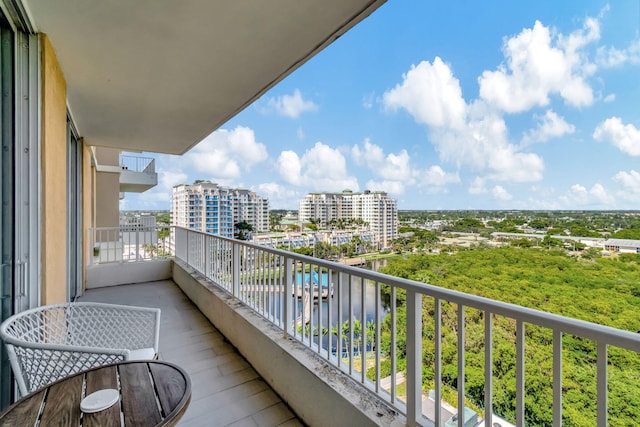 balcony featuring a water view