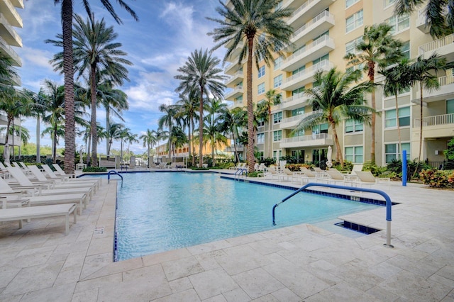 view of swimming pool featuring a patio