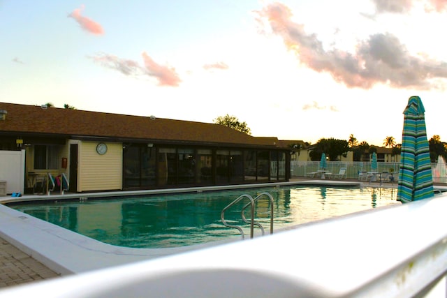 view of swimming pool with a patio