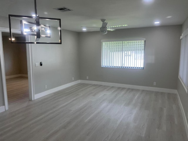 interior space with light wood-type flooring and ceiling fan