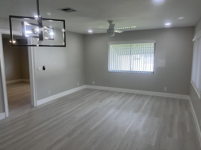 14910 Wildflower Ln, Delray Beach, FL 33446 - empty room featuring wood finished floors, a ceiling fan, and baseboards