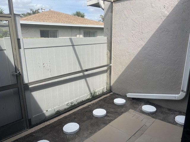 14910 Wildflower Ln, Delray Beach, FL 33446 - exterior view of stucco siding