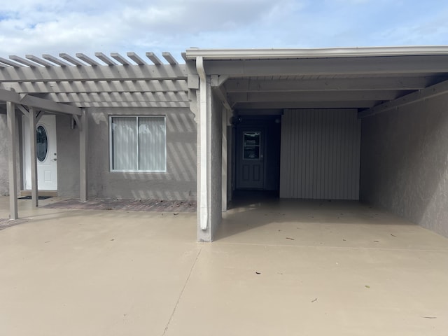 14910 Wildflower Ln, Delray Beach, FL 33446 - view of front of home with a carport and stucco siding