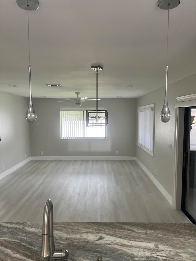 interior space with hardwood / wood-style flooring