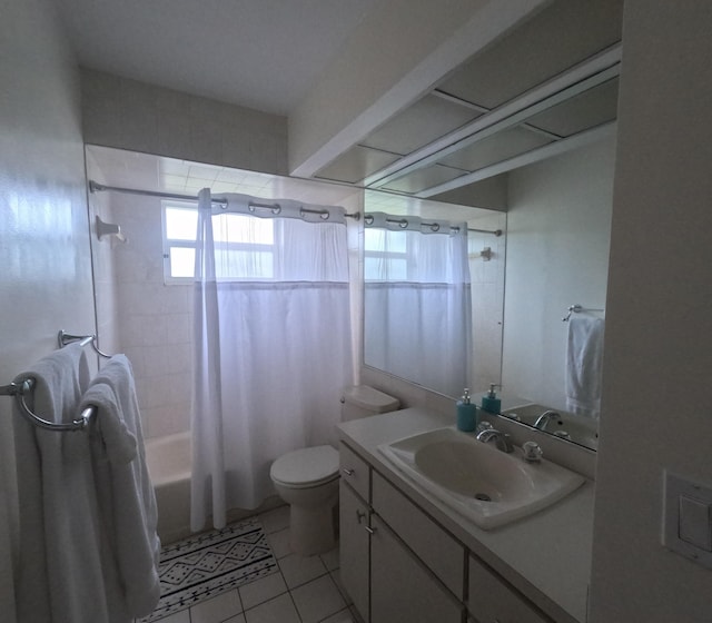 full bathroom featuring tile patterned flooring, vanity, shower / bath combo, and toilet