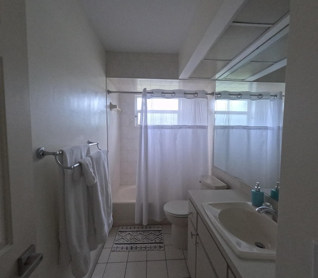 full bathroom featuring tile patterned flooring, vanity, toilet, and shower / tub combo