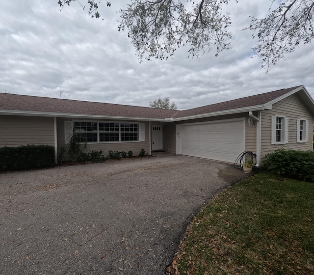 ranch-style house with a garage