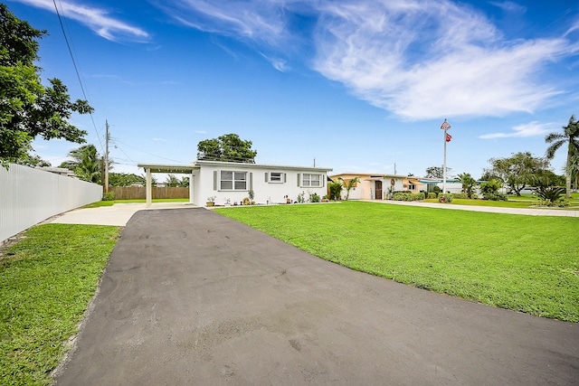 view of front of property with a front lawn