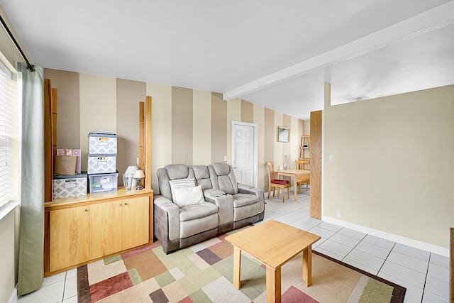 tiled living room featuring beamed ceiling