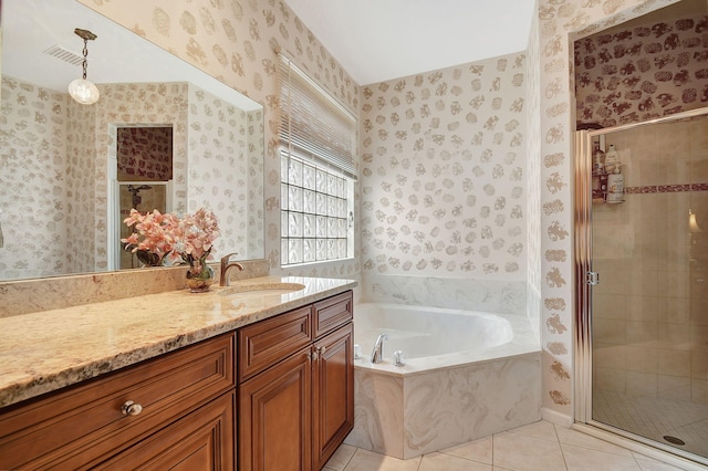 bathroom featuring vanity, separate shower and tub, and tile patterned flooring