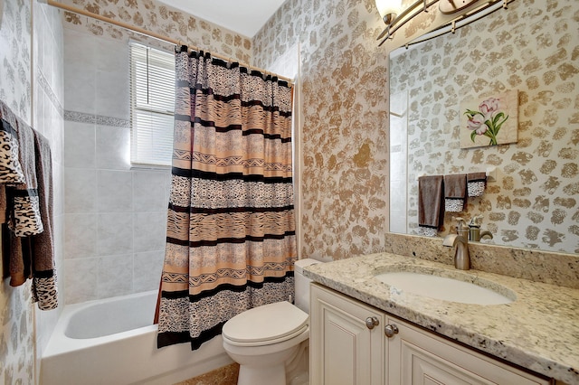 full bathroom featuring vanity, shower / tub combo, and toilet