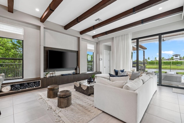 tiled living room with beamed ceiling