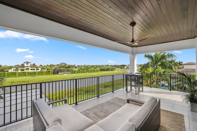 view of patio / terrace featuring ceiling fan, a balcony, and outdoor lounge area