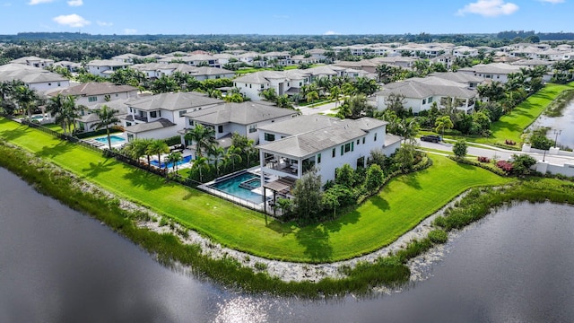 birds eye view of property featuring a water view