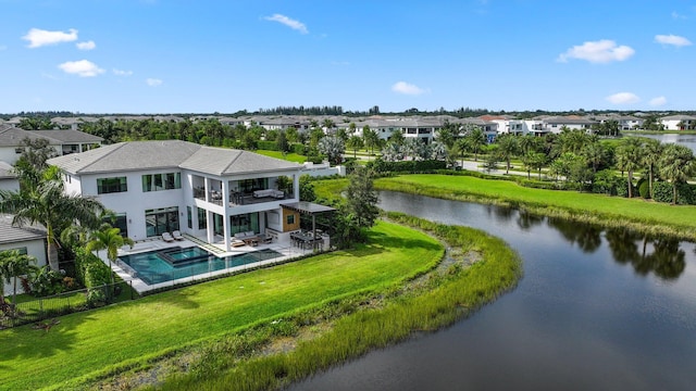 drone / aerial view with a water view