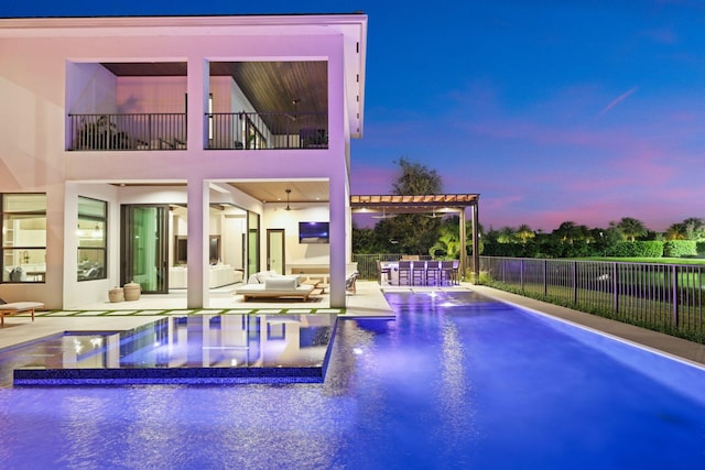 view of swimming pool with a patio area and a pergola