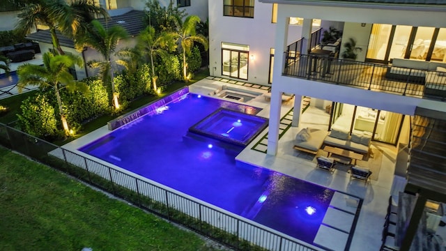 view of pool featuring an in ground hot tub and a patio area