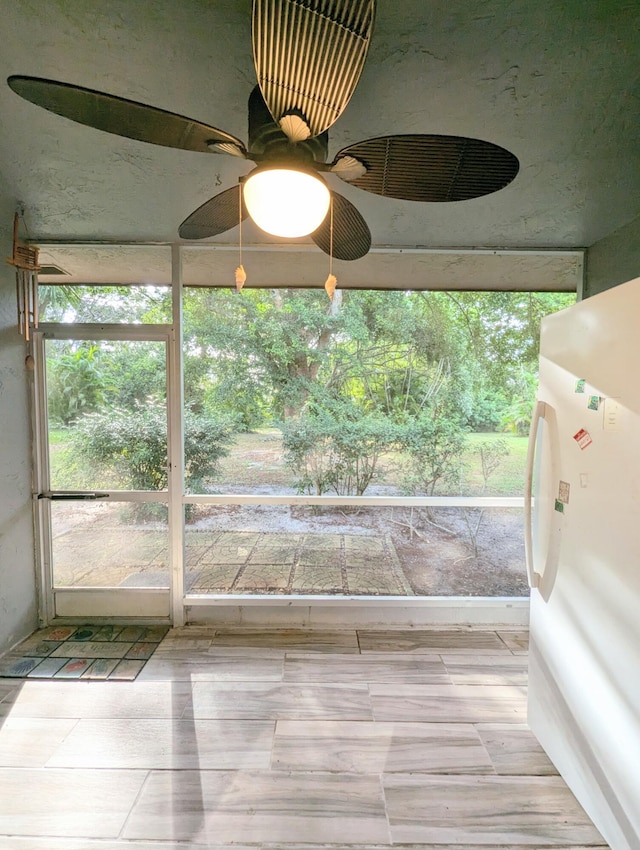 1914 Palmland Dr Unit B, Boynton Beach, FL 33436 - detailed view of ceiling fan and freestanding refrigerator