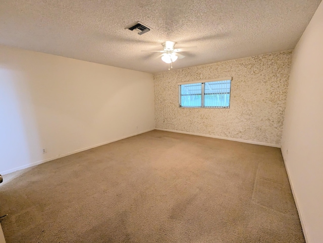 1914 Palmland Dr Unit B, Boynton Beach, FL 33436 - empty room featuring carpet, ceiling fan, a textured ceiling, and baseboards
