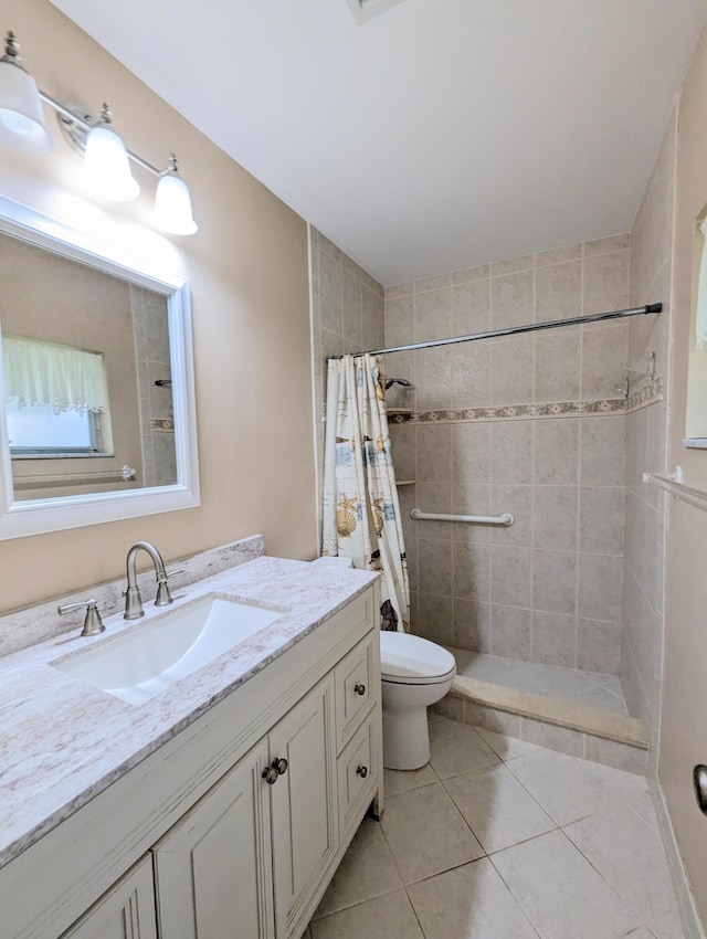 1914 Palmland Dr Unit B, Boynton Beach, FL 33436 - full bathroom featuring a tile shower, tile patterned flooring, toilet, and vanity