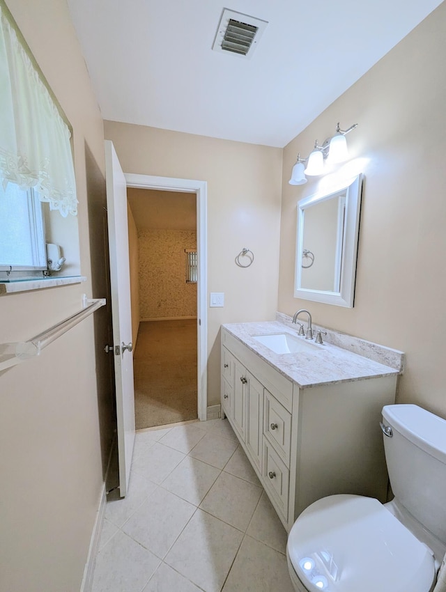 1914 Palmland Dr Unit B, Boynton Beach, FL 33436 - bathroom with toilet, tile patterned flooring, vanity, and baseboards