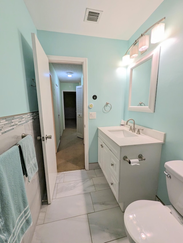 1914 Palmland Dr Unit B, Boynton Beach, FL 33436 - half bath featuring marble finish flooring, toilet, and vanity