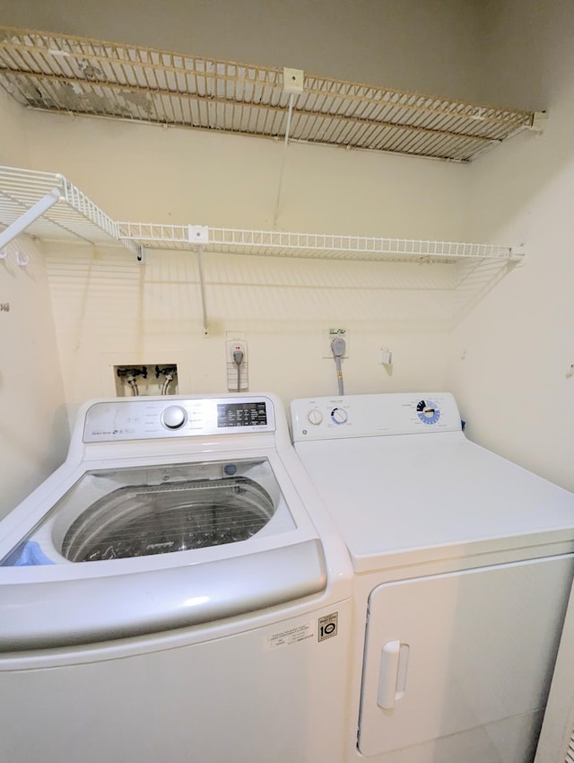 1914 Palmland Dr Unit B, Boynton Beach, FL 33436 - clothes washing area with washer and dryer