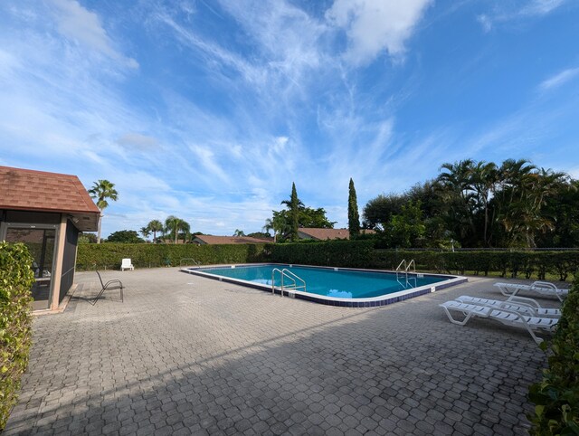 1914 Palmland Dr Unit B, Boynton Beach, FL 33436 - community pool featuring a patio